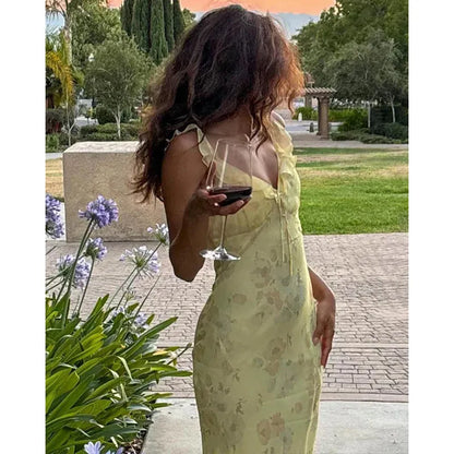 Robe flora dos nu à Volants & l'essence de l'été coquette